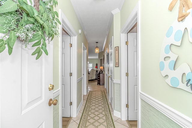 hall featuring light tile patterned flooring