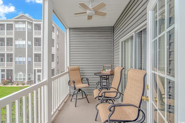 balcony featuring ceiling fan