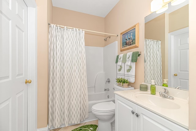 full bathroom featuring shower / bath combo with shower curtain, tile patterned flooring, vanity, and toilet