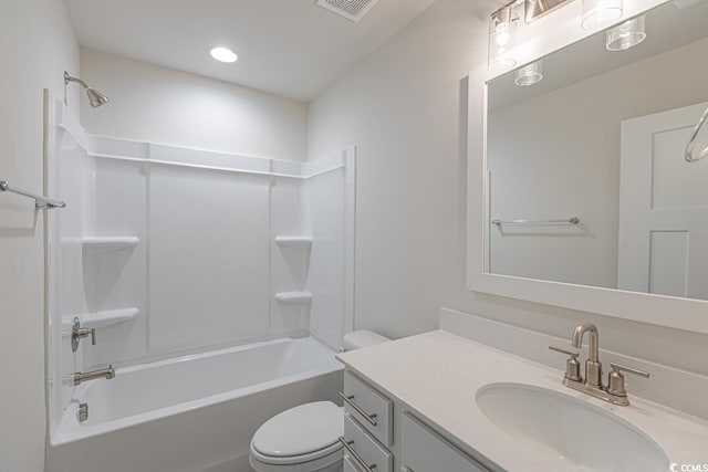 full bathroom featuring vanity,  shower combination, and toilet