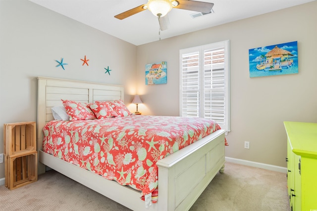 bedroom with light carpet and ceiling fan