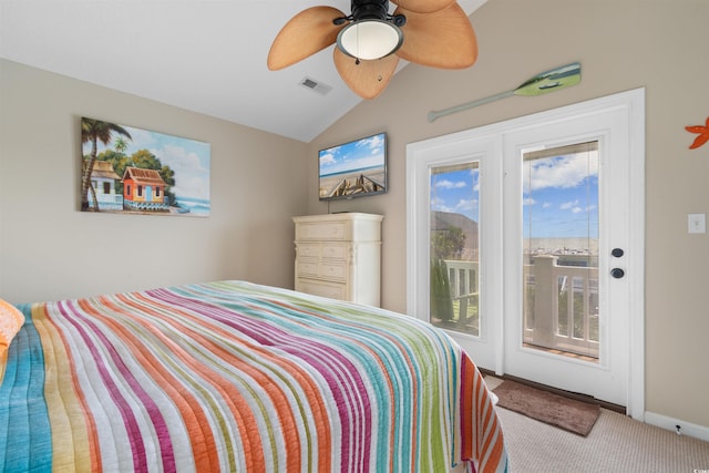 bedroom with ceiling fan, vaulted ceiling, access to exterior, and carpet