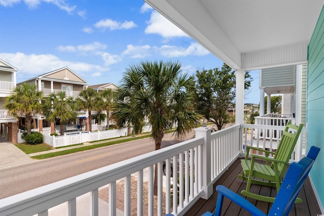 balcony featuring covered porch