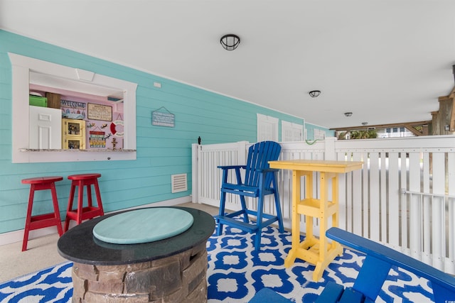 117B Ocean Blvd S, Surfside Beach, SC 29575 - exterior space featuring wood walls and visible vents