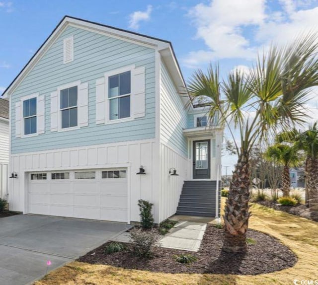 front facade with a garage