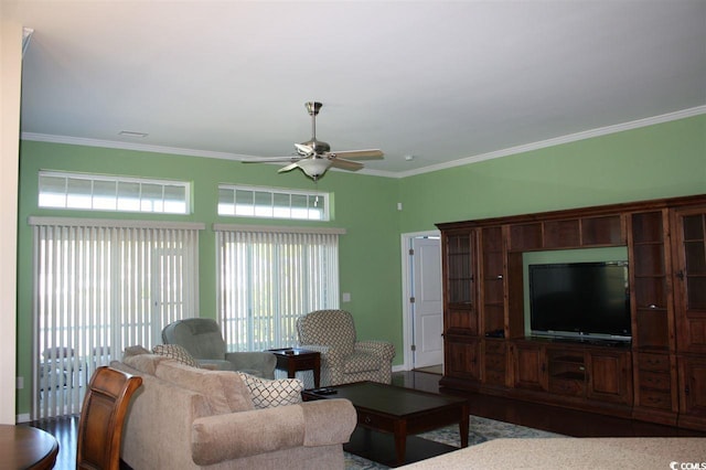 living room with ceiling fan, wood-type flooring, and ornamental molding