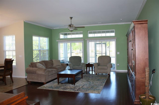 living room featuring ornamental molding, ceiling fan, and dark hardwood / wood-style floors