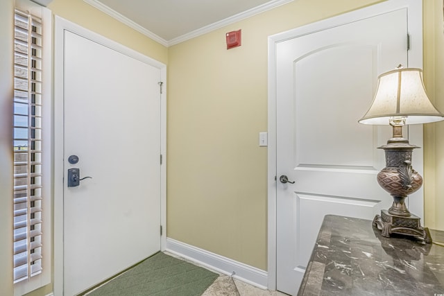 doorway to outside featuring crown molding