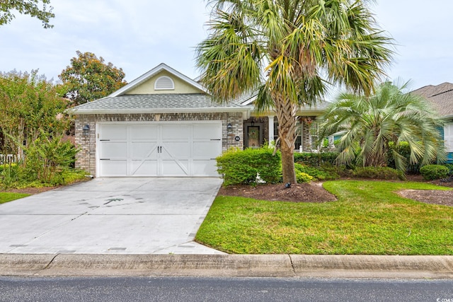 single story home featuring a front lawn and a garage