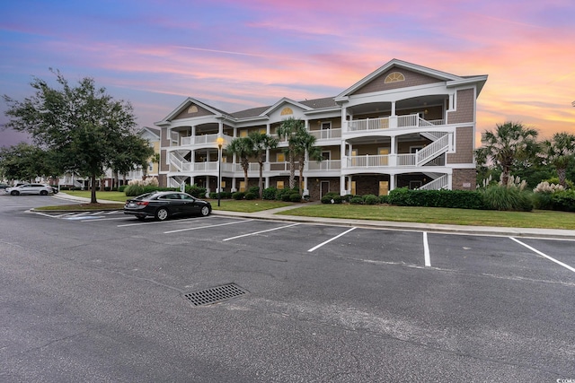 view of outdoor building at dusk