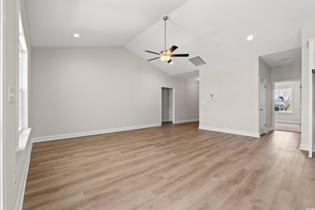 unfurnished living room featuring baseboards, visible vents, a ceiling fan, lofted ceiling, and light wood-type flooring