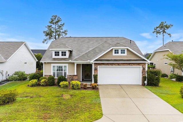 craftsman-style home with a front lawn and a garage