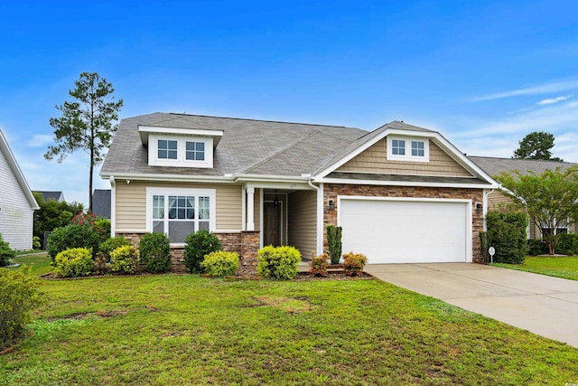 craftsman-style house with a front lawn and a garage