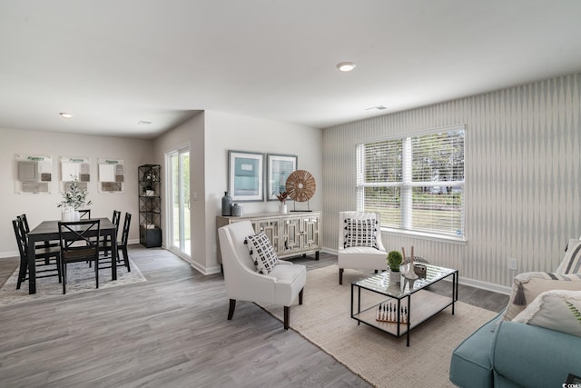 living room with light hardwood / wood-style flooring