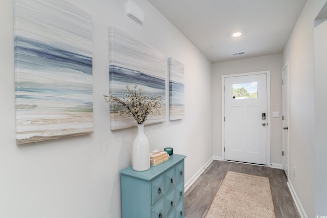 doorway to outside featuring dark hardwood / wood-style floors