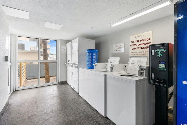 washroom with stacked washer and dryer, independent washer and dryer, and a textured ceiling