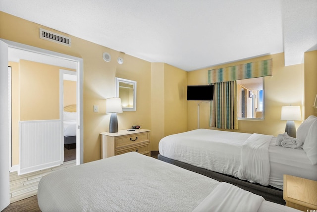 bedroom featuring hardwood / wood-style floors