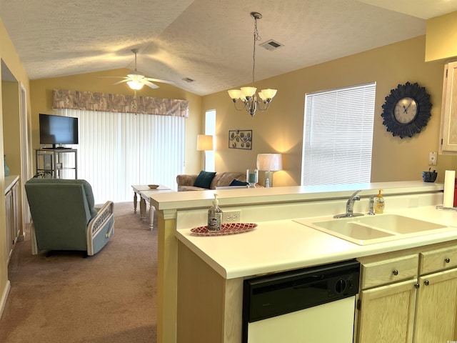 kitchen featuring dishwasher, lofted ceiling, light carpet, ceiling fan with notable chandelier, and sink