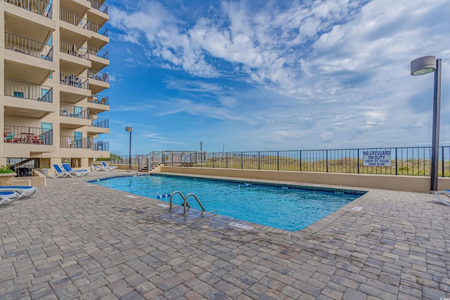 view of pool with a patio area