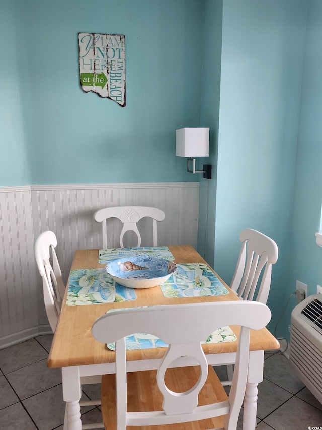 dining room with tile patterned flooring