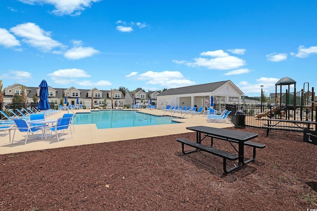 view of swimming pool featuring a patio