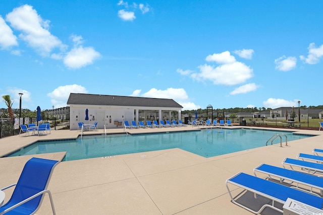 view of pool featuring a patio area