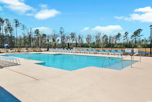 view of pool featuring a patio area