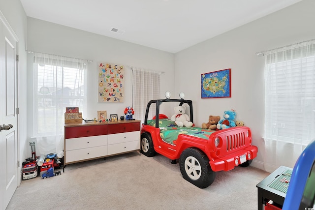 bedroom featuring carpet