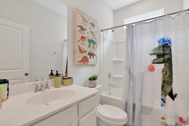 full bathroom featuring vanity, shower / bath combo with shower curtain, and toilet