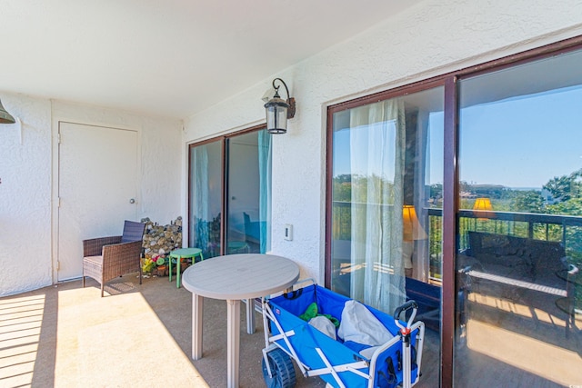 view of patio with a balcony