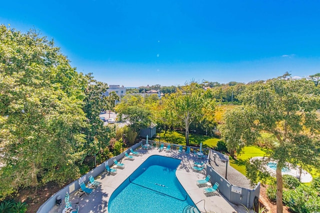 view of swimming pool featuring a patio