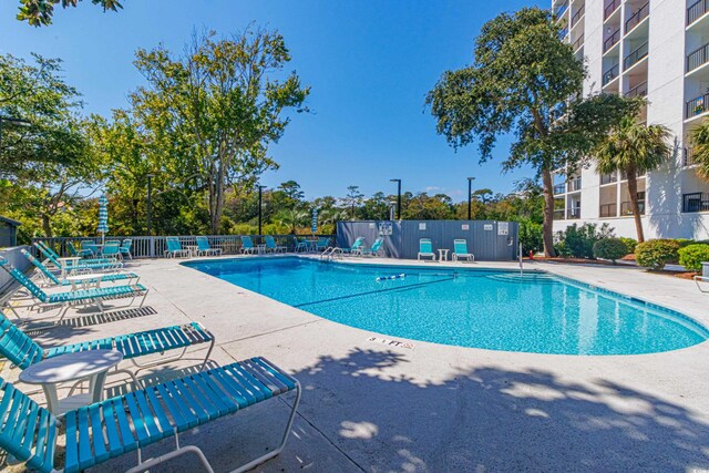 view of swimming pool featuring a patio