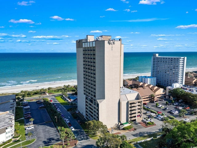 aerial view with a view of the beach and a water view