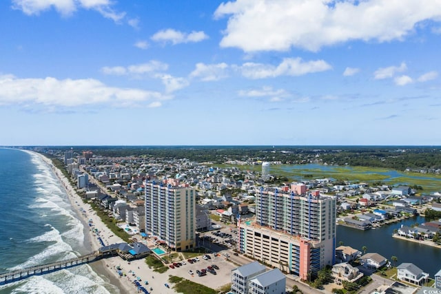 bird's eye view with a view of the beach and a water view