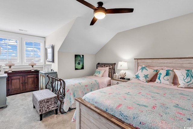 bedroom with light carpet, lofted ceiling, and ceiling fan