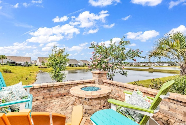 view of patio / terrace with a water view