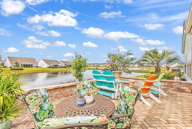 view of patio featuring a water view