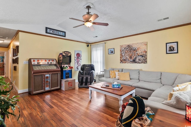 living room featuring vaulted ceiling, ceiling fan, dark hardwood / wood-style floors, and crown molding