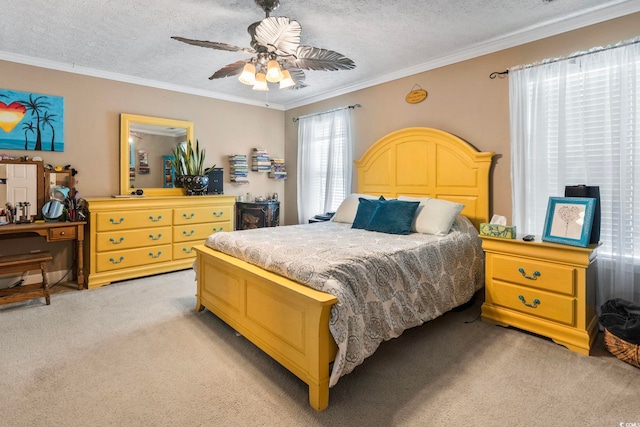 bedroom featuring a textured ceiling, ornamental molding, ceiling fan, and light colored carpet