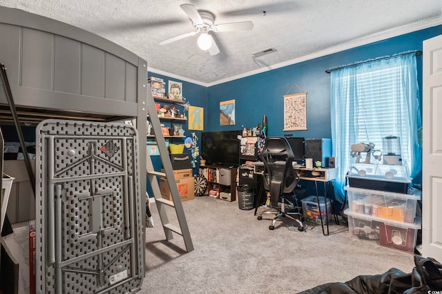 office with a textured ceiling, crown molding, ceiling fan, and light colored carpet