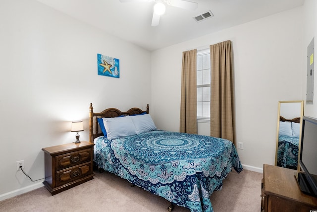 bedroom featuring ceiling fan and light colored carpet