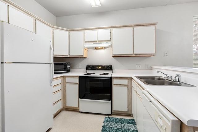 kitchen featuring white cabinets, white appliances, and sink