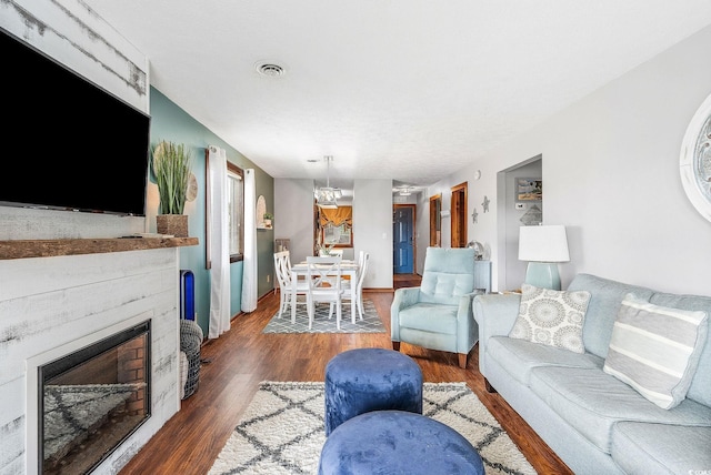 living room with dark hardwood / wood-style flooring