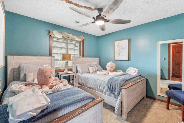 bedroom with light carpet, a textured ceiling, and ceiling fan