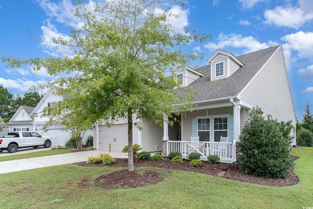 cape cod-style house featuring a garage, a front lawn, and a porch