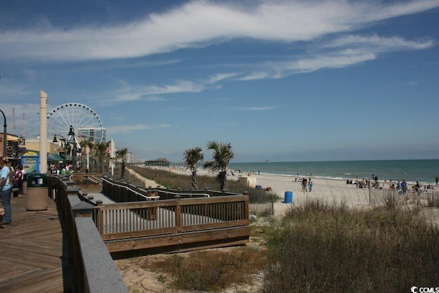 view of water feature with a beach view