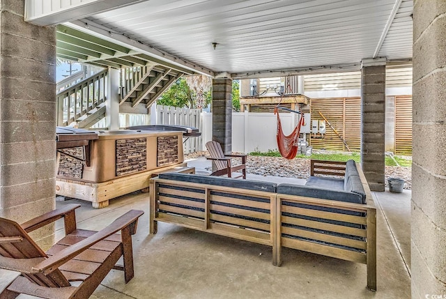 view of patio / terrace featuring an outdoor fire pit