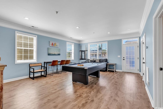 rec room with light wood-type flooring, pool table, and crown molding