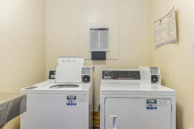 washroom featuring washer and dryer