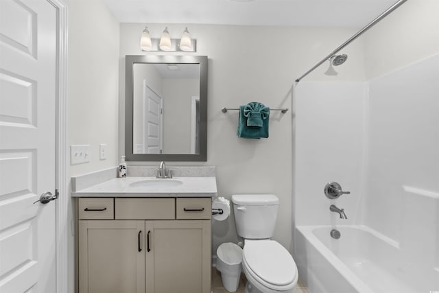 full bathroom with vanity, toilet, and shower / washtub combination